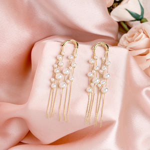 Gold pearly tassle earrings