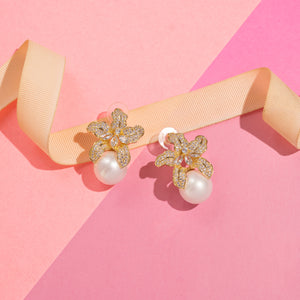 Small pearly diamond earrings