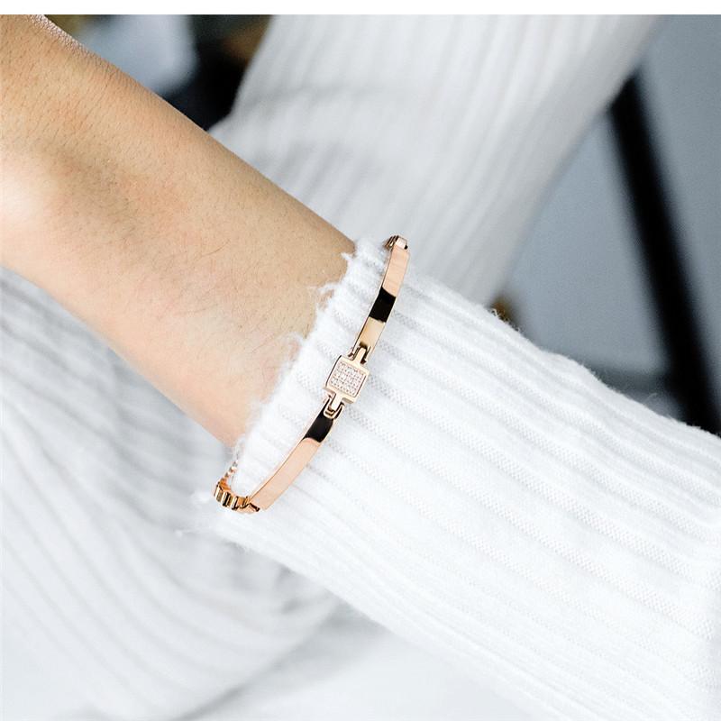 Elegant zircon statement bracelet wear by a woman